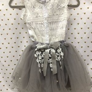 Two piece shirt and skirt. Size 8-9.